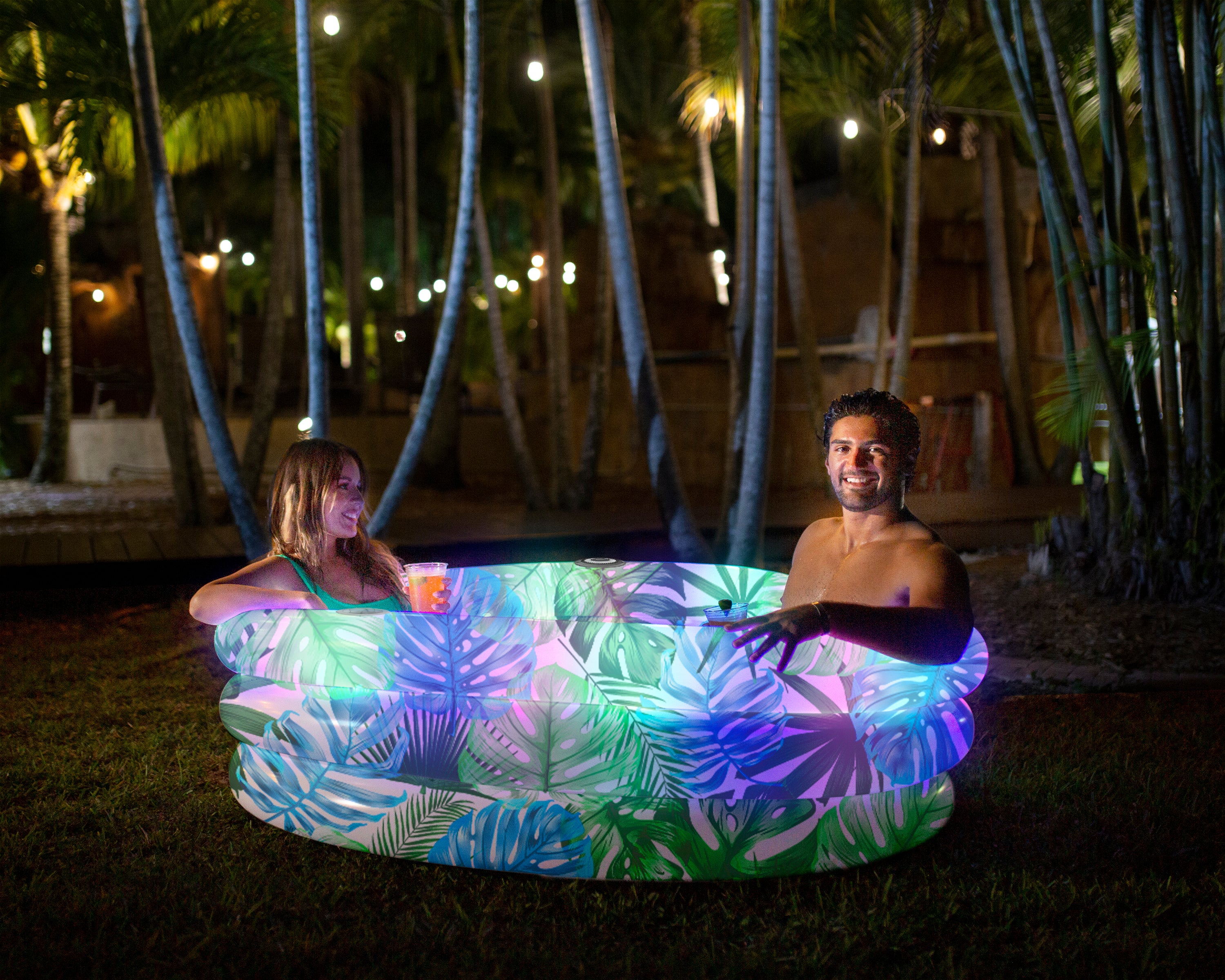 PoolCandy Tropical Palms Illuminated Sunning Pool with Bluetooth Speaker - Perfect for Day or Night