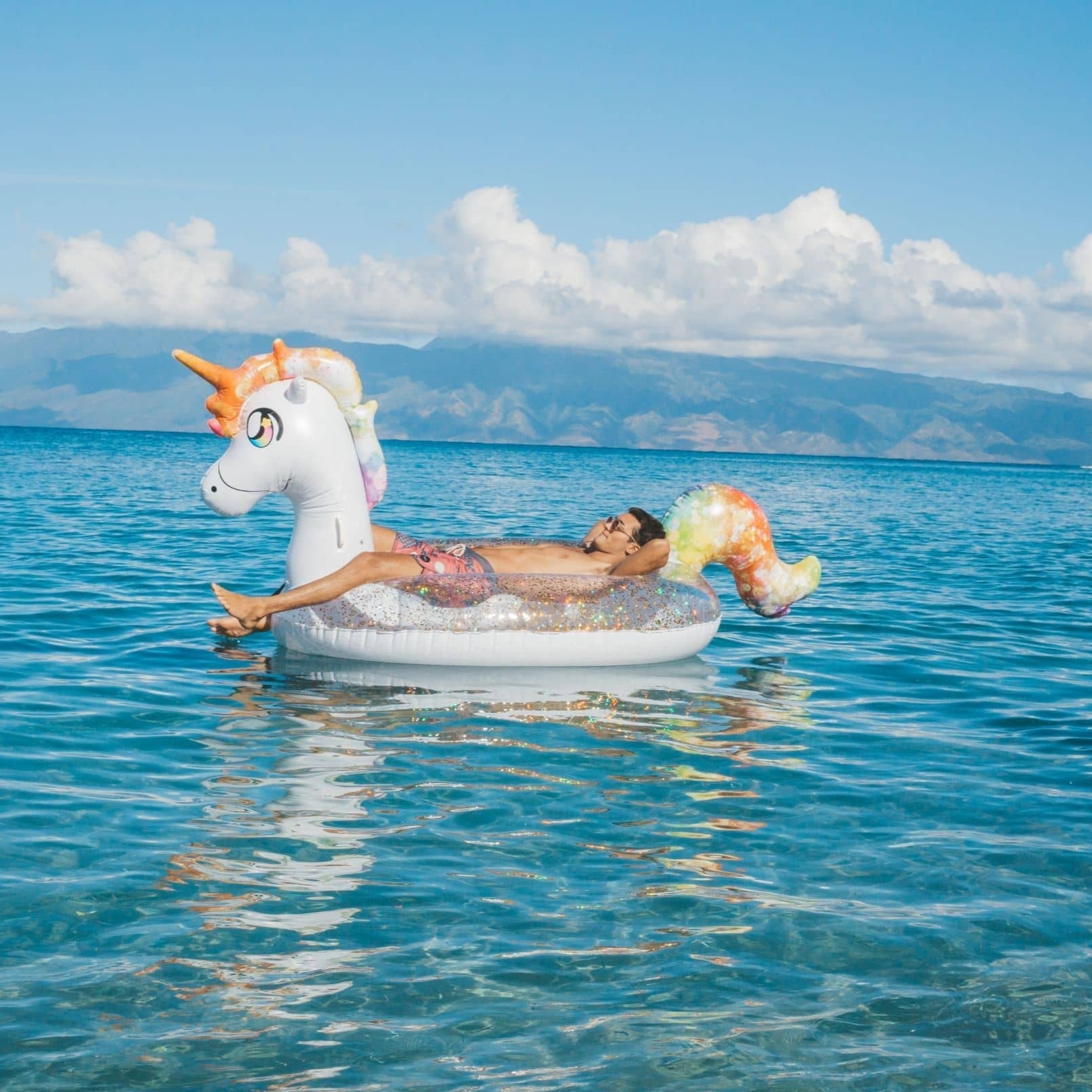 Rainbow store unicorn float